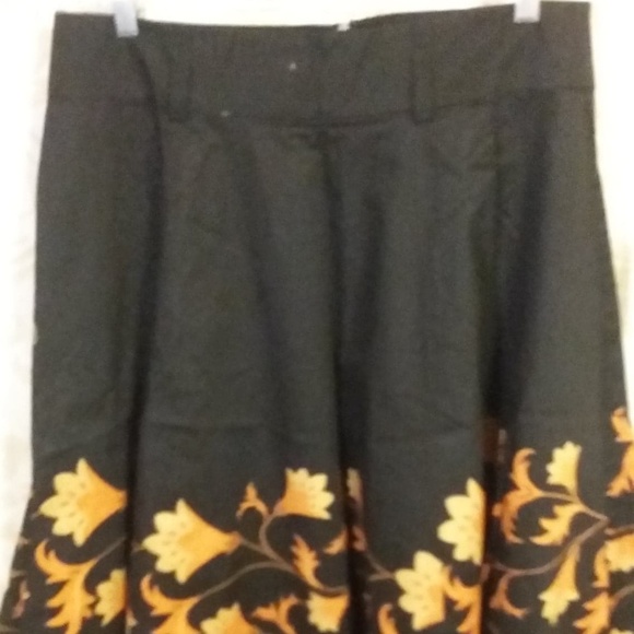 Black circle skirt with orange and yellow hem - Picture 1 of 3